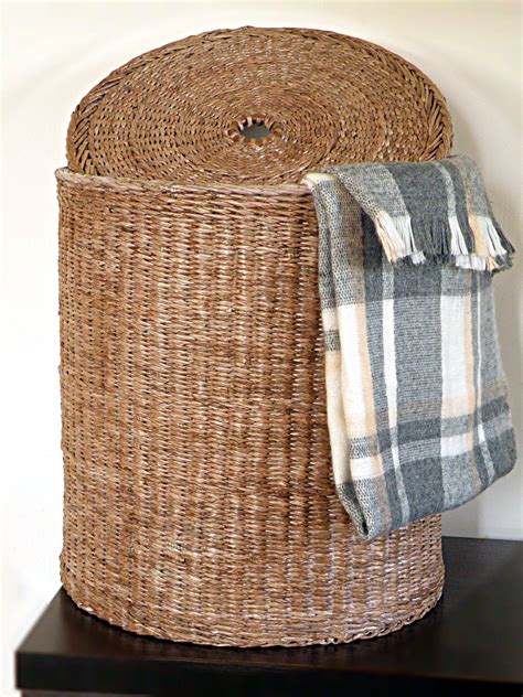 wicker basket for throw blankets.